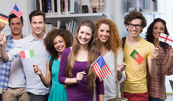 International students holding flags