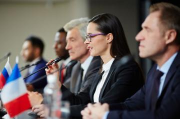 young politician at government meeting